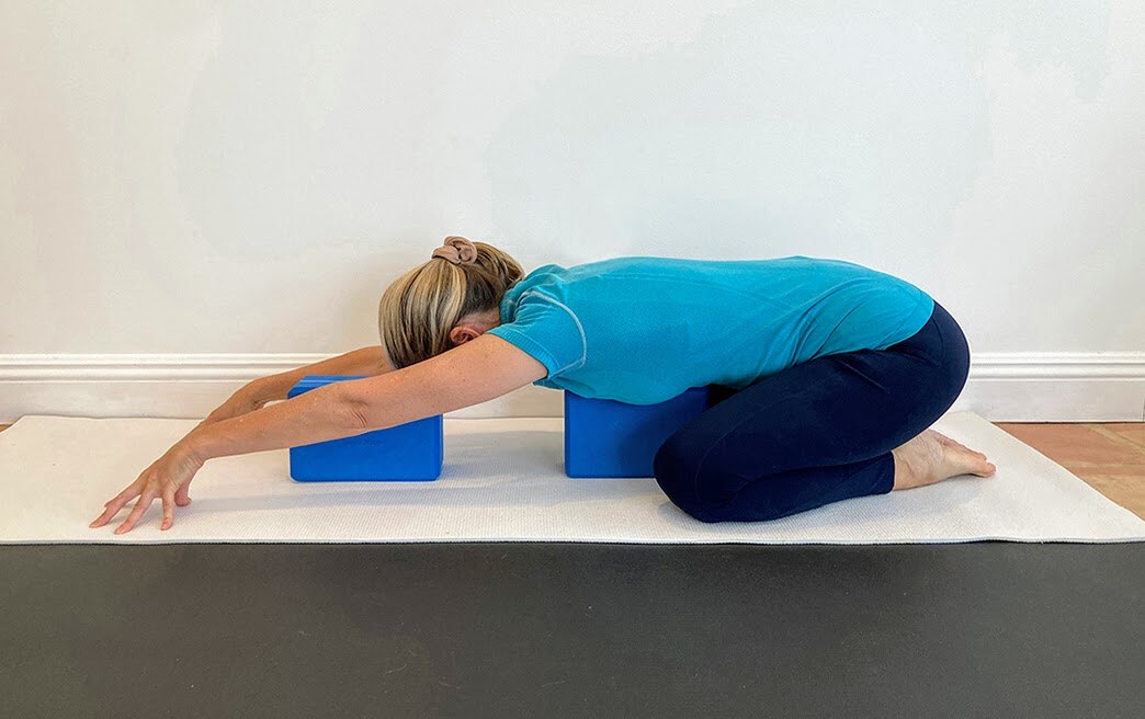 6 - Adho Mukha Virasana downward facing hero pose