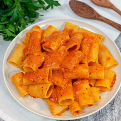 Rigatoni Pasta with Homemade Roasted Red Bell Pepper Sauce on Plate