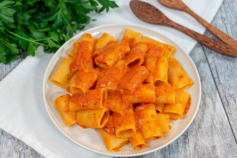 Rigatoni Pasta with Homemade Roasted Red Bell Pepper Sauce on Plate