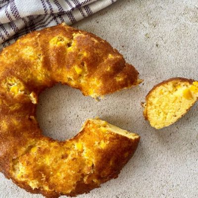 Bundt Pan Cornbread on Counter Next to Tea Towel