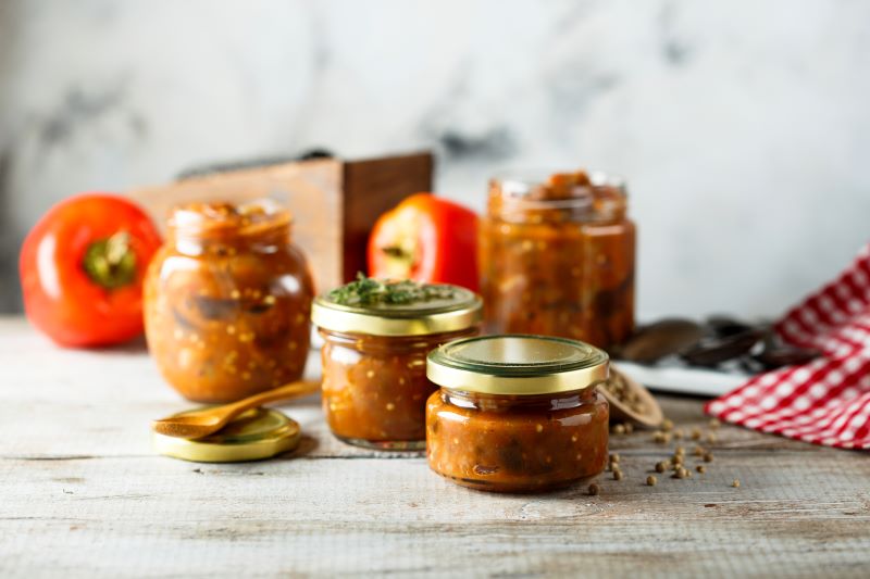 Homemade Hot Sauce in Glass Jars on Countertop