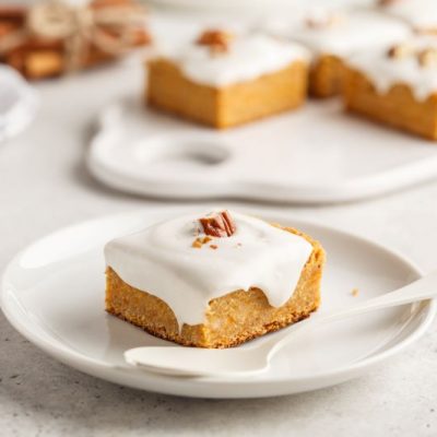Pumpkin Squares with Vanilla Frosting on Dessert Plate