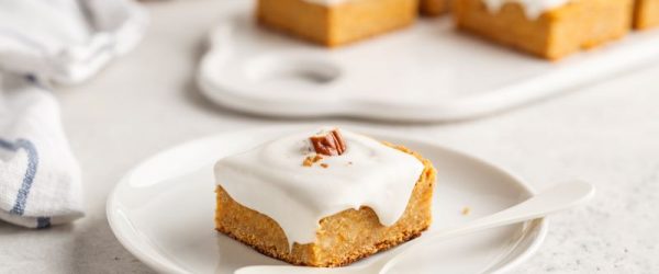 Pumpkin Squares with Vanilla Frosting on Dessert Plate