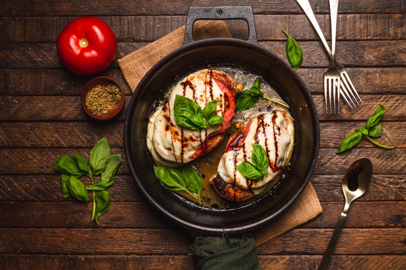 Chicken Caprese Dish Served in Cast Iron Skillet