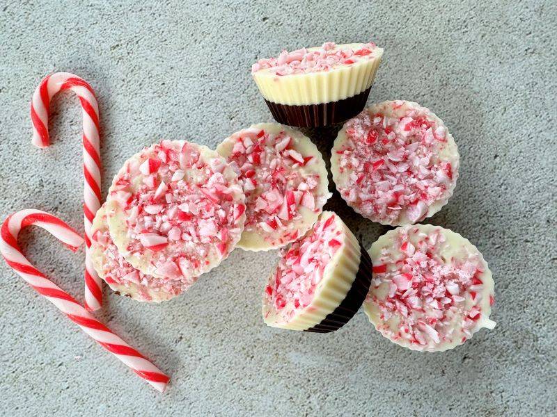 Peppermint Chocolate Cups on Countertop with Candy Canes