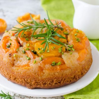 Gluten-Free Apricot Upside-Down Cake on White Cake Plate