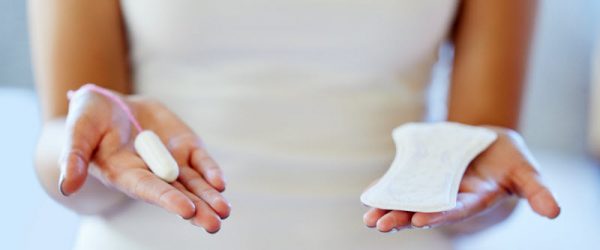Woman Holding Organic Cotton Tampon and Pad to Represent Beatrice Dixon The Honey Pot Interview