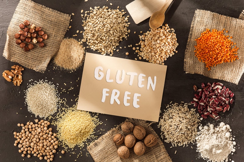 Concept of What is Celiac Disease Represented by Various Grains Surrounding Gluten-Free Sign