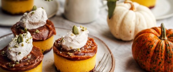 Three Mini Vegan Pumpkin Cakes Show Three Layers – a Crumbly Base, Pureed Creamy Pumpkin Middle and Caramel Top Made from Dates.