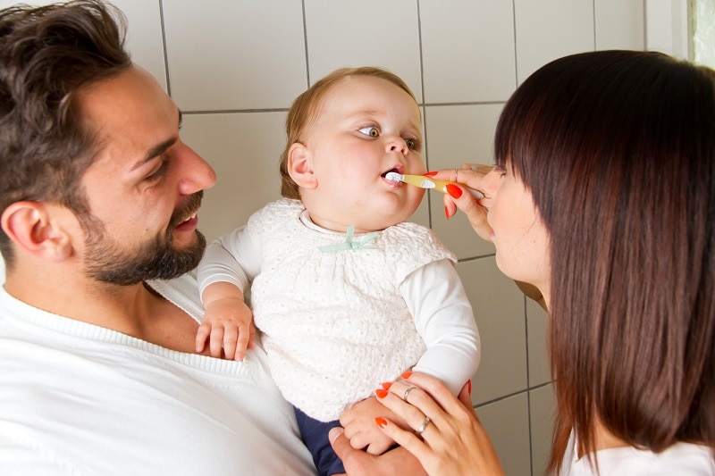 When to Start Brushing Baby Teeth & More Oral Care Tips for Baby