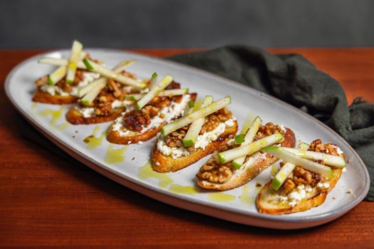 Goat Cheese Crostini With Candied Walnuts and Pickled Apples