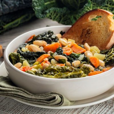 Kale & Cannellini Bean Soup in Large White Bowl
