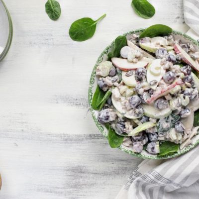 Vegan Waldorf Salad With Apples, Celery & Walnuts in Bowl on White-Washed Table Top