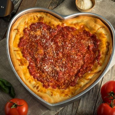 Gluten-Free Deep-Dish Heart-Shaped Pizza in Springform Pan on Cutting Board