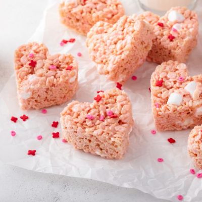Pink, Heart-Shaped Vegan Rice Crispy Treats With Sprinkles on Top