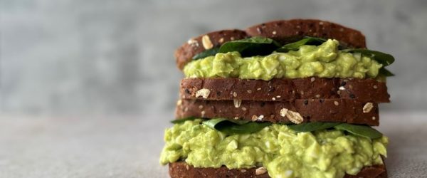 Avocado Egg Salad Sandwich on Dark Whole Grain Bread