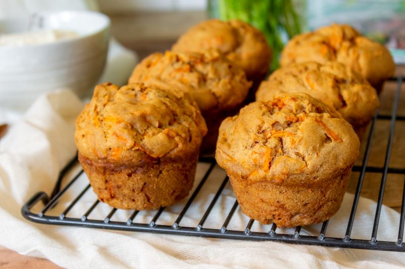 Gluten-Free Carrot Cake Muffins on Cooling Rack in Kitchen