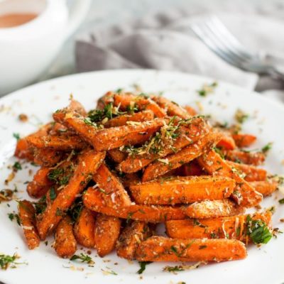 Roasted Carrot Side Dish with Parmesan & Herbs on White Serving Plate