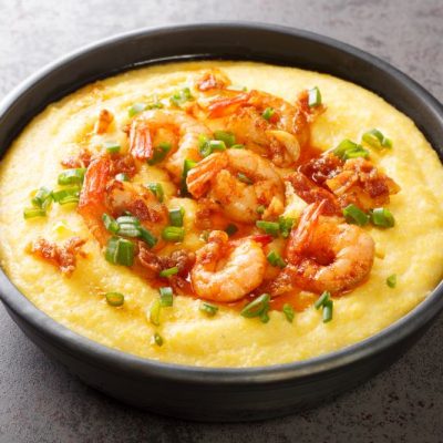 Southern Shrimp & Grits in Bowl with Bacon Crumbles & Chopped Green Onion on Top