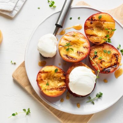 Grilled Peaches with Vanilla Cashew Cream & Mint