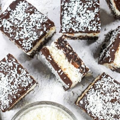 These Coconut Brownies Have Chocolate Layers Sandwiching a Thick Coconut Filling.