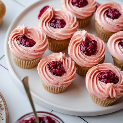 Peanut Butter & Jelly Cupcakes with Strawberry Frosting on Round Serving Plate