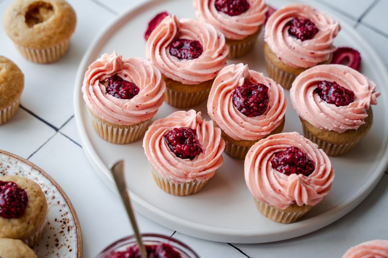 Peanut Butter & Jelly Cupcakes with Strawberry Frosting on Round Serving Plate