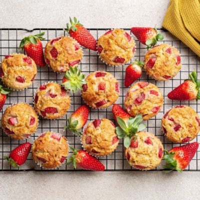 Strawberry Banana Muffins Cooling on Metal Rack