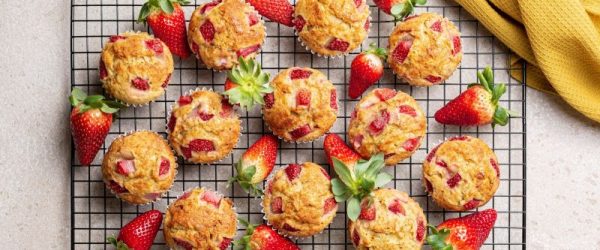 Strawberry Banana Muffins Cooling on Metal Rack