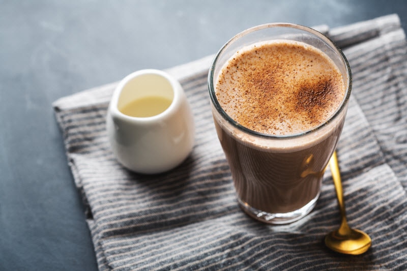 Overhead View of Chai Latte to Represent Concept of Lead in Cinnamon