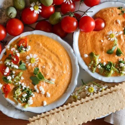 Tirokafteri: Greek Spicy Feta Dip in Serving Bowls With Crackers & Grape Tomatoes Set on the Side