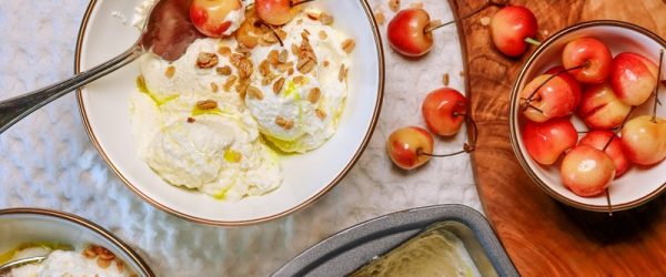 Olive Oil Ice Cream Topped With Fresh Cherries and Granola