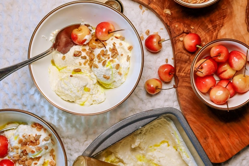 Olive Oil Ice Cream Olive Oil Ice Cream Topped With Fresh Cherries and Granola