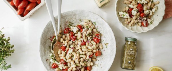 Overhead View of White Bean Salad With Cherry Tomatoes, Simply Organic Spices and Lemon Dressing