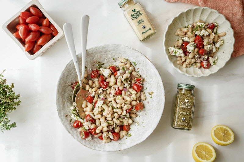 Overhead View of White Bean Salad With Cherry Tomatoes, Simply Organic Spices and Lemon Dressing