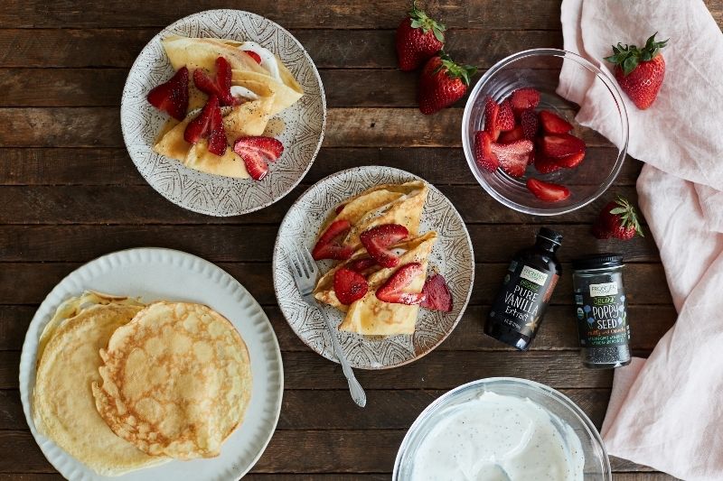 Vanilla Crème Crepes With Strawberry-Poppy Seed Topping