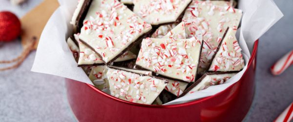 Gourmet Dark Chocolate Peppermint Bark Dark Chocolate Peppermint Bark in a Red Holiday Tin With Candy Canes and Ornaments