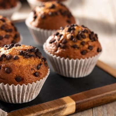 Jumbo Chocolate Chip Muffins Sit on a Serving Tray.