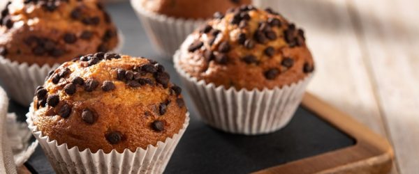 Jumbo Chocolate Chip Muffins Sit on a Serving Tray.