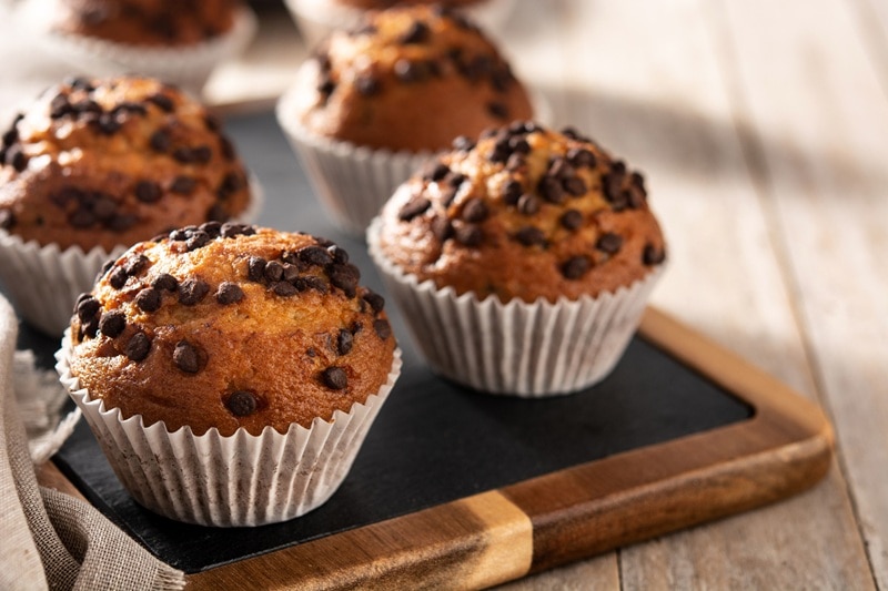 Jumbo Chocolate Chip Muffins Sit on a Serving Tray.