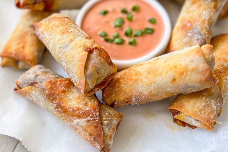 Close-Up of Golden-Brown Southwestern Egg Rolls & Salsa-Ranch Dipping Sauce