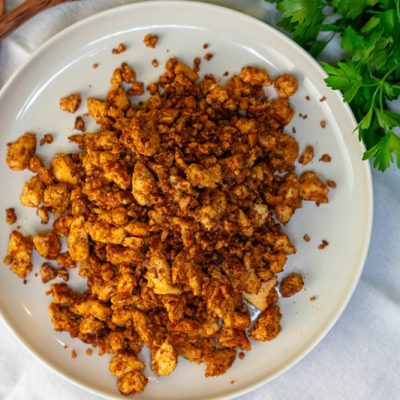 A Plate is Filled With Homemade Tofu Sausage Crumbles.
