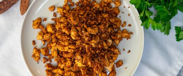 A Plate is Filled With Homemade Tofu Sausage Crumbles.
