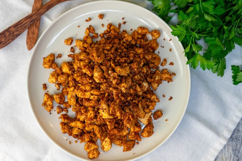 A Plate is Filled With Homemade Tofu Sausage Crumbles.