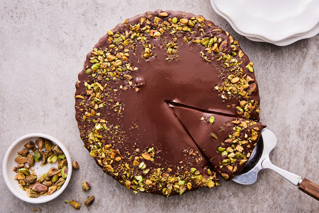 Dark Chocolate Pistachio Tart On Table Ready For Serving