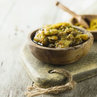 Eggplant Spread in Rustic Wooden Bowl on Wood Serving Board
