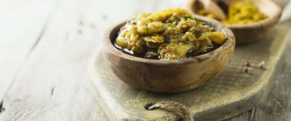 Eggplant Spread in Rustic Wooden Bowl on Wood Serving Board