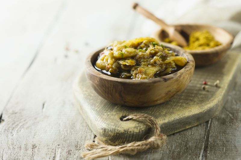 Eggplant Spread in Rustic Wooden Bowl on Wood Serving Board