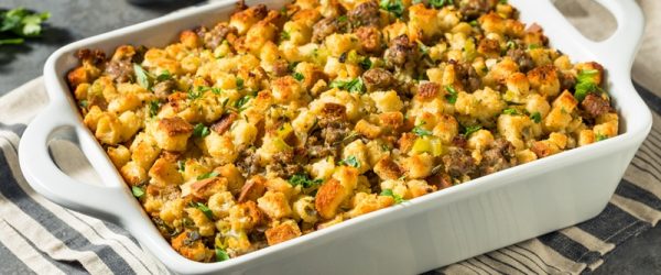 A Casserole of Low FODMAP Stuffing is Garnished With Fresh Herbs.