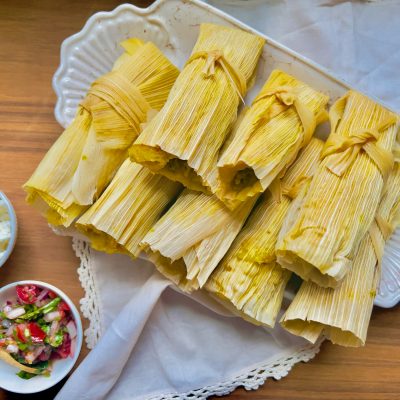 Savory Pumpkin Tamales With Dips on Wood Table